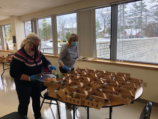 Chris and Bev filling boxes